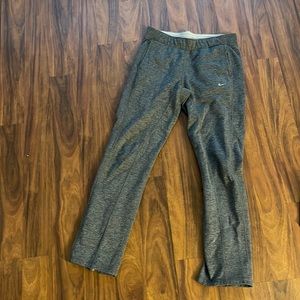 Gray Nike sweat pants with zip bottom